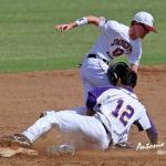 Joey Gamez slides safely into second base.