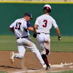 Ky Sandelovic steps on first base for the out.