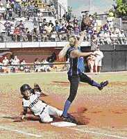 Shiner�s Lauren Michalec safely slides to the bag